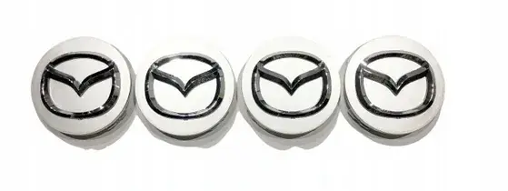 Kup teraz DEKIELKI ZNACZKI KAPSLE MAZDA 56 MM DO FELG